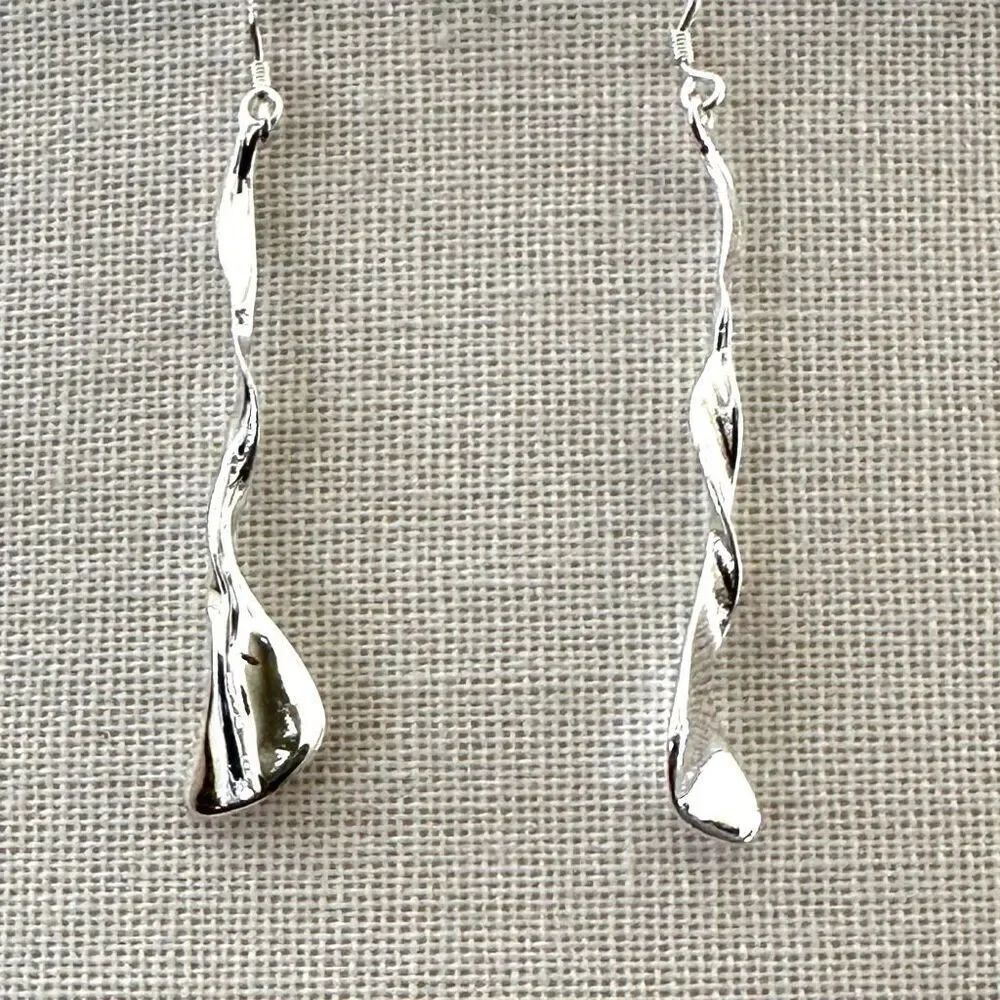 Silver tone twisted drop earrings